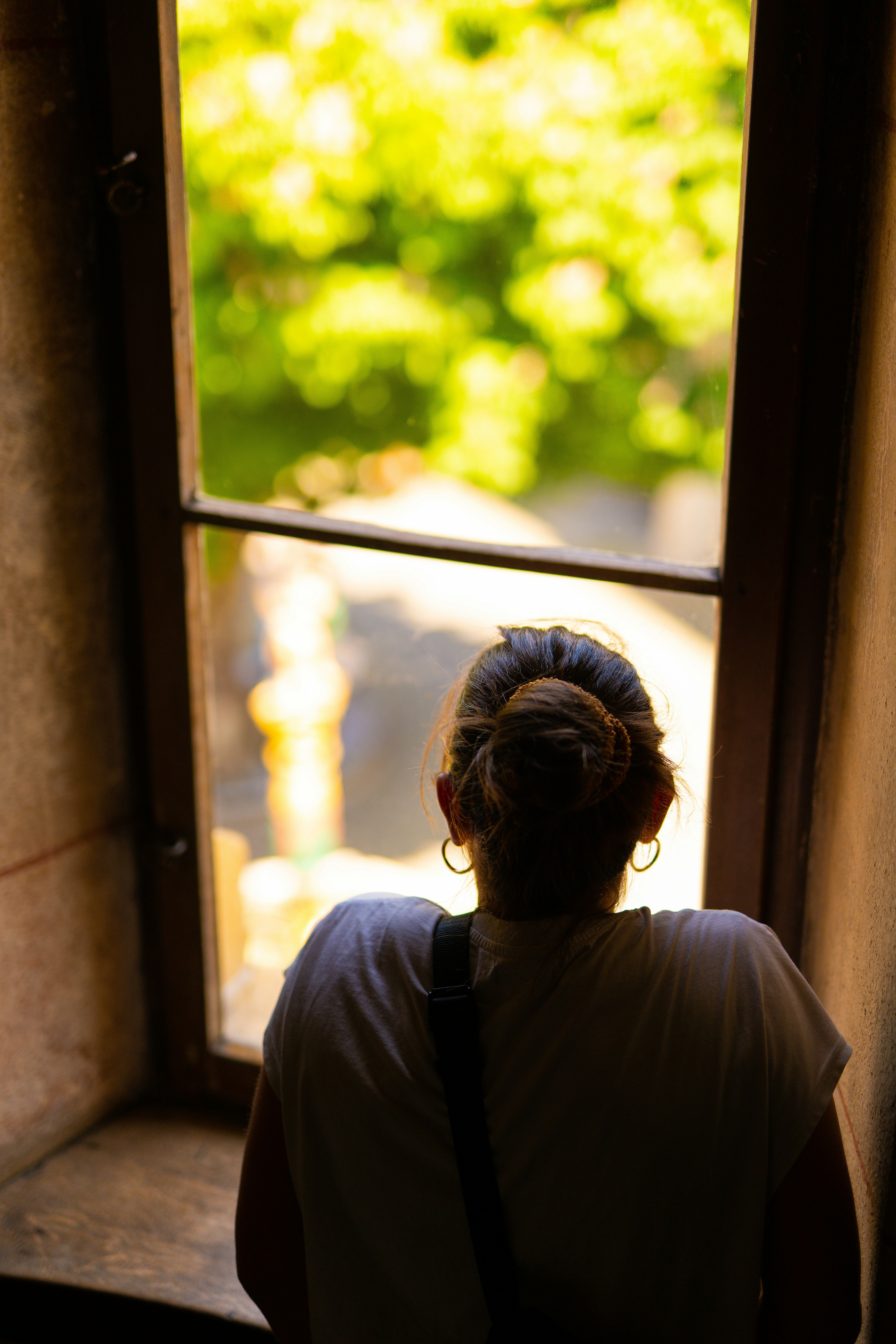 Person looking out of a window